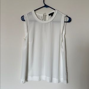 White sleeveless blouse